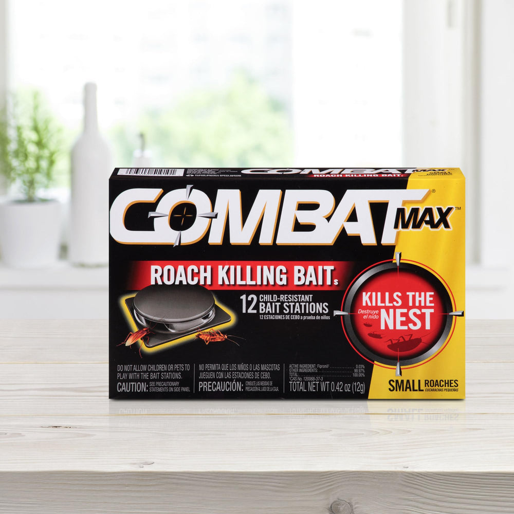 Gel application point on a wall crack with Combat Max Defense System targets hidden roaches.