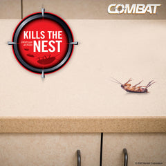 Combat roach bait station behind appliance targets roaches near devices