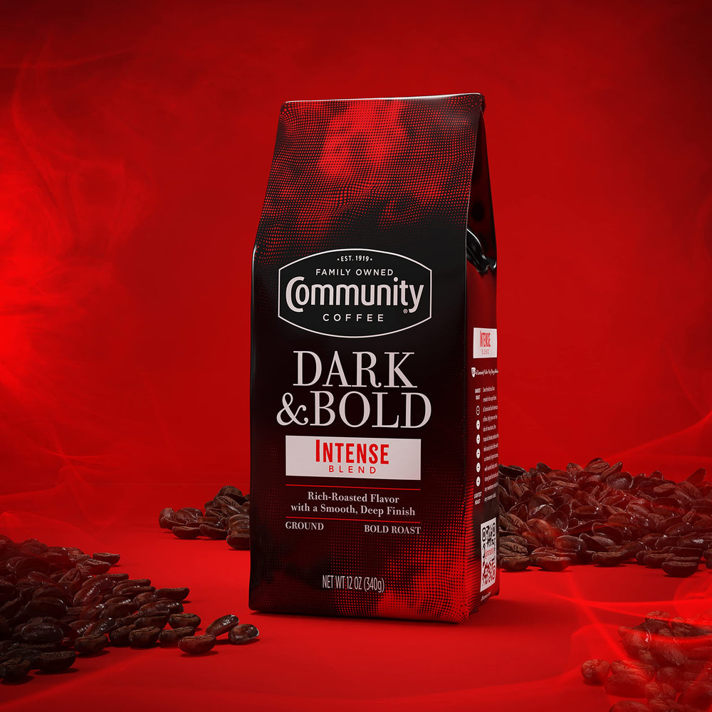 Community Coffee Dark & Bold Intense Blend ground coffee close-up roast highlighting rich aroma.