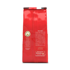 Community Coffee Signature Dark Roast being poured for a smooth cup