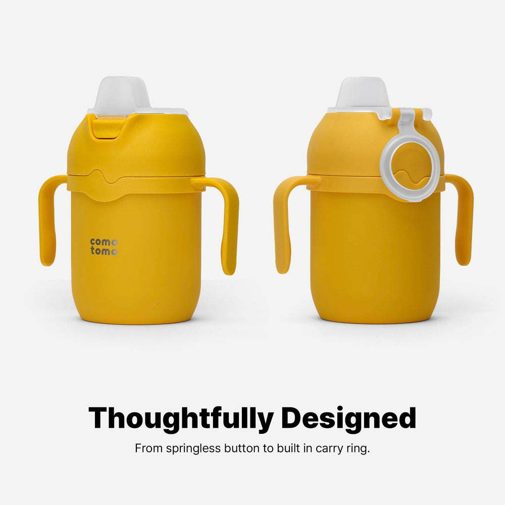 Comotomo Toddler Tumbler yellow leak-proof design helps prevent spills during outings.