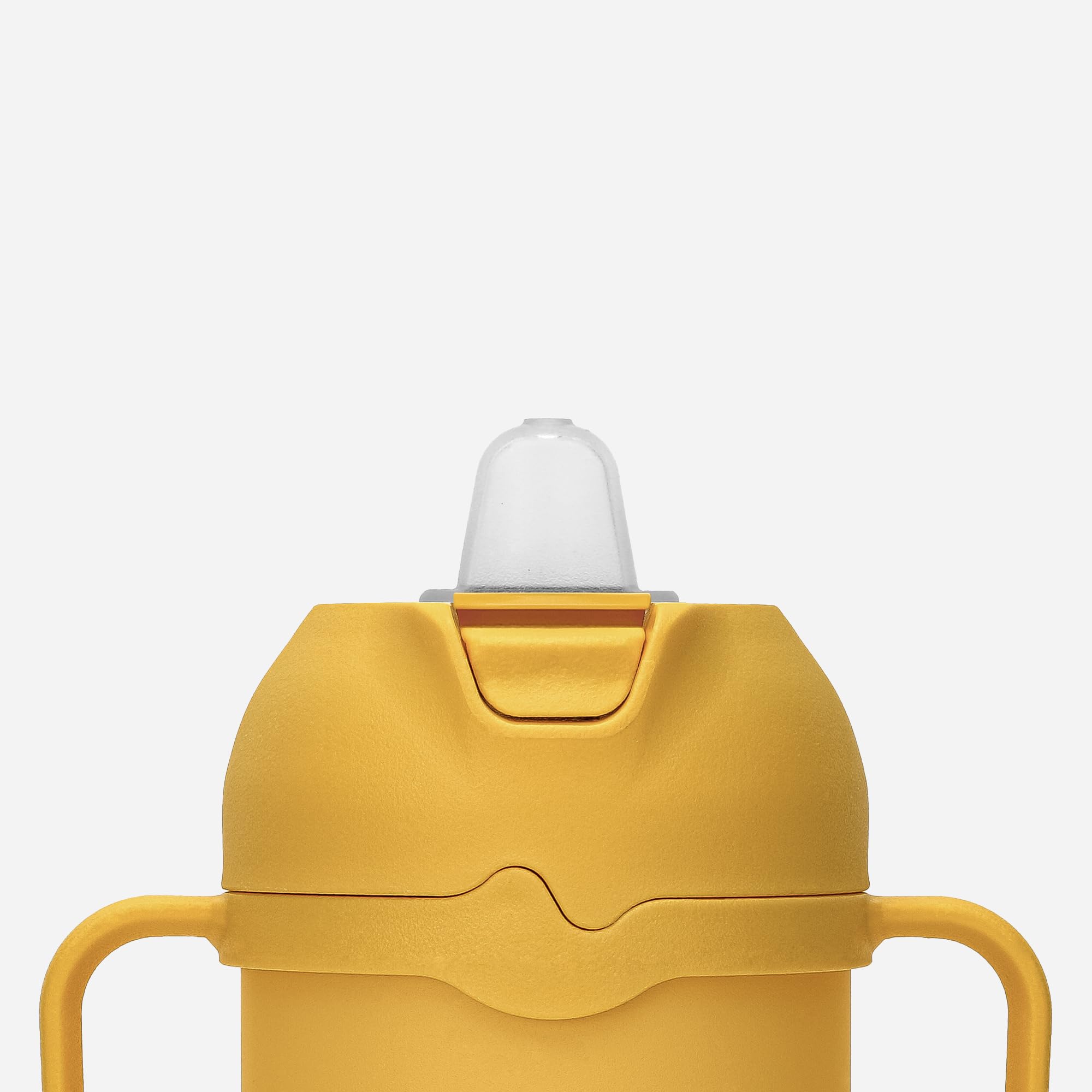 Comotomo Toddler Tumbler yellow straw supports sipping flexibility for curious toddlers.