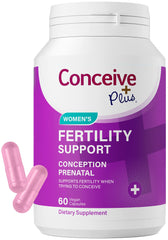Conceive Plus bottle pour showing daily fertility support capsules.