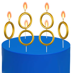 Conelist gold ring candle on cake for blue-theme party visuals.