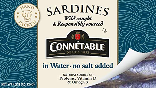 Connetable sardines in water on a cracker, ideal quick savory snack.