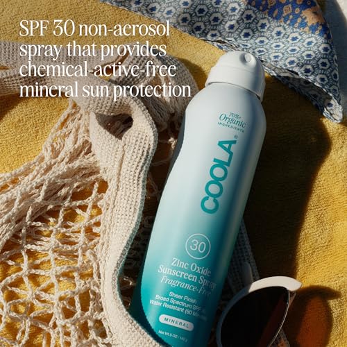 COOLA mineral sunscreen spray application for quick coverage