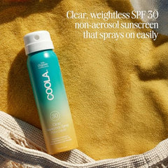 COOLA Piña Colada sunscreen spray in action for daily outdoor protection.