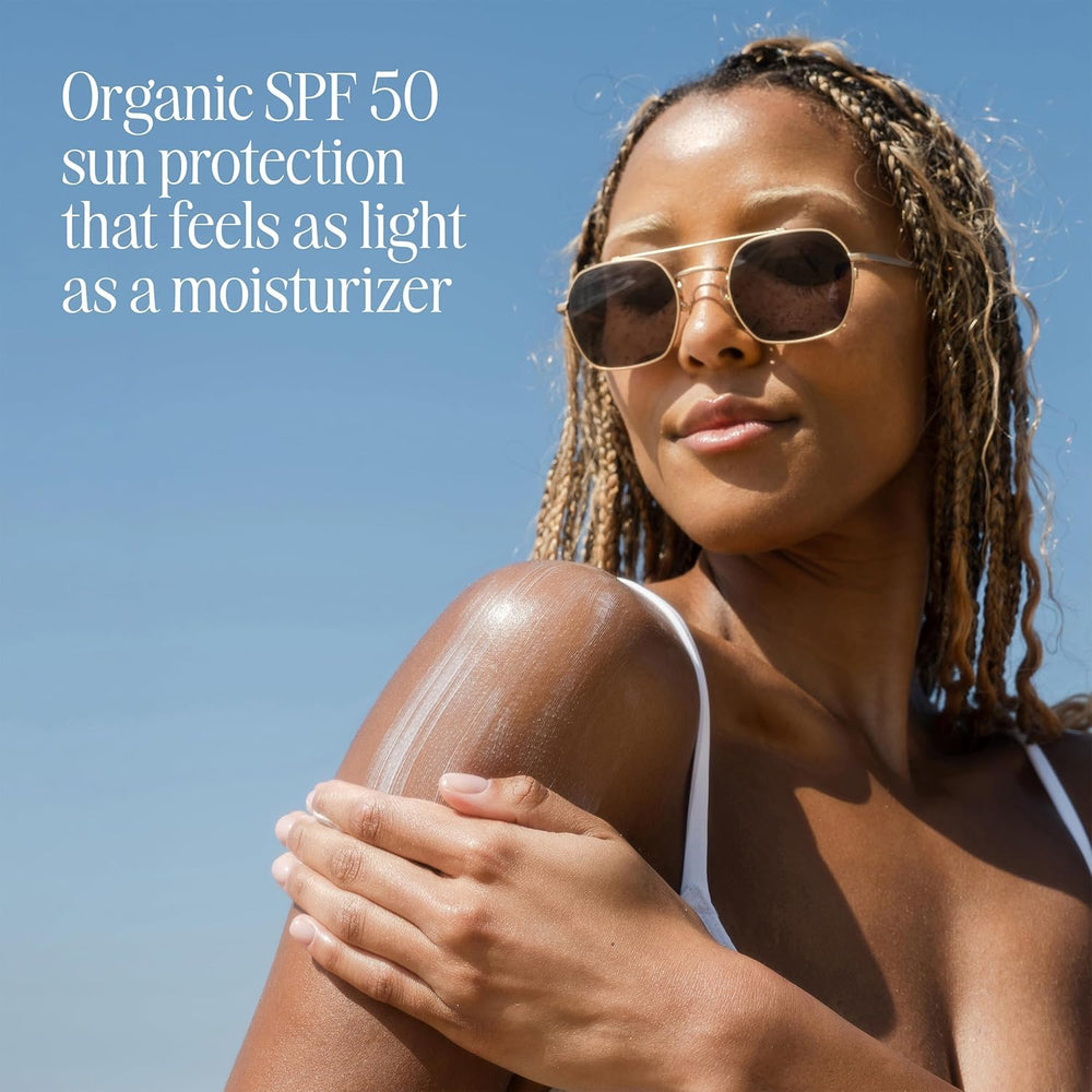 COOLA SPF 50 body lotion applied to arm for easy daily coverage