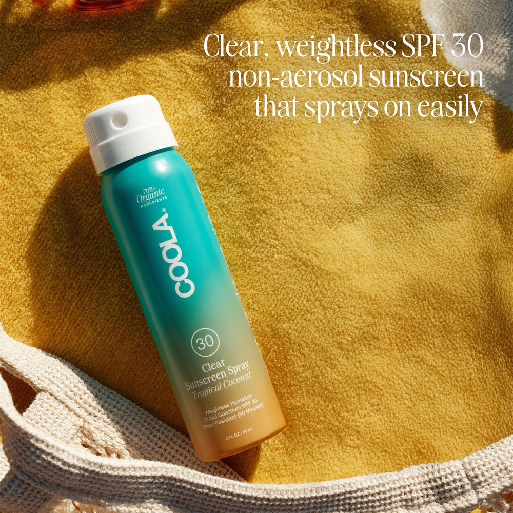 COOLA Tropical Coconut scent on skin for a refreshing feel.
