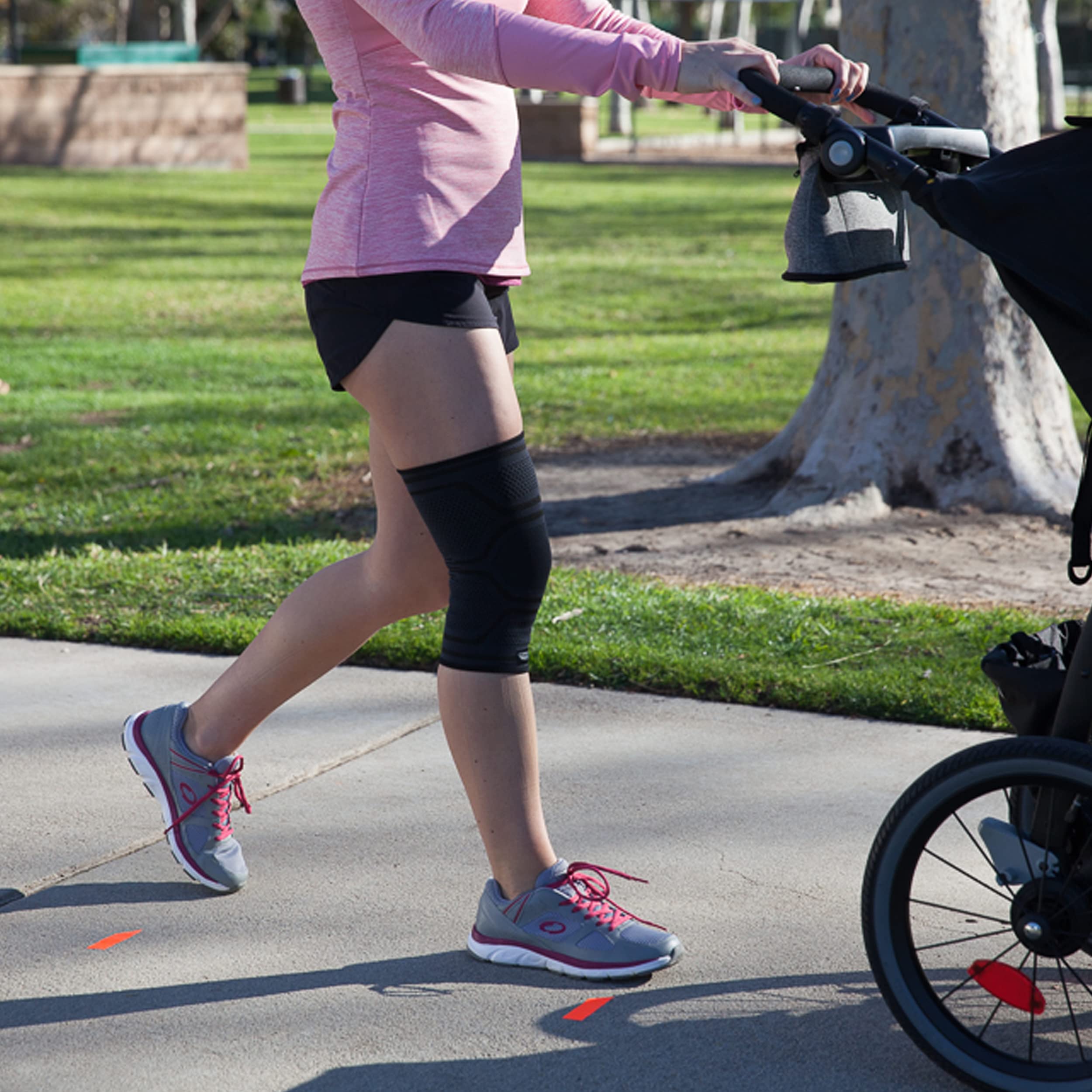 Copper Fit Cool knee sleeve worn under clothes supports everyday activity.