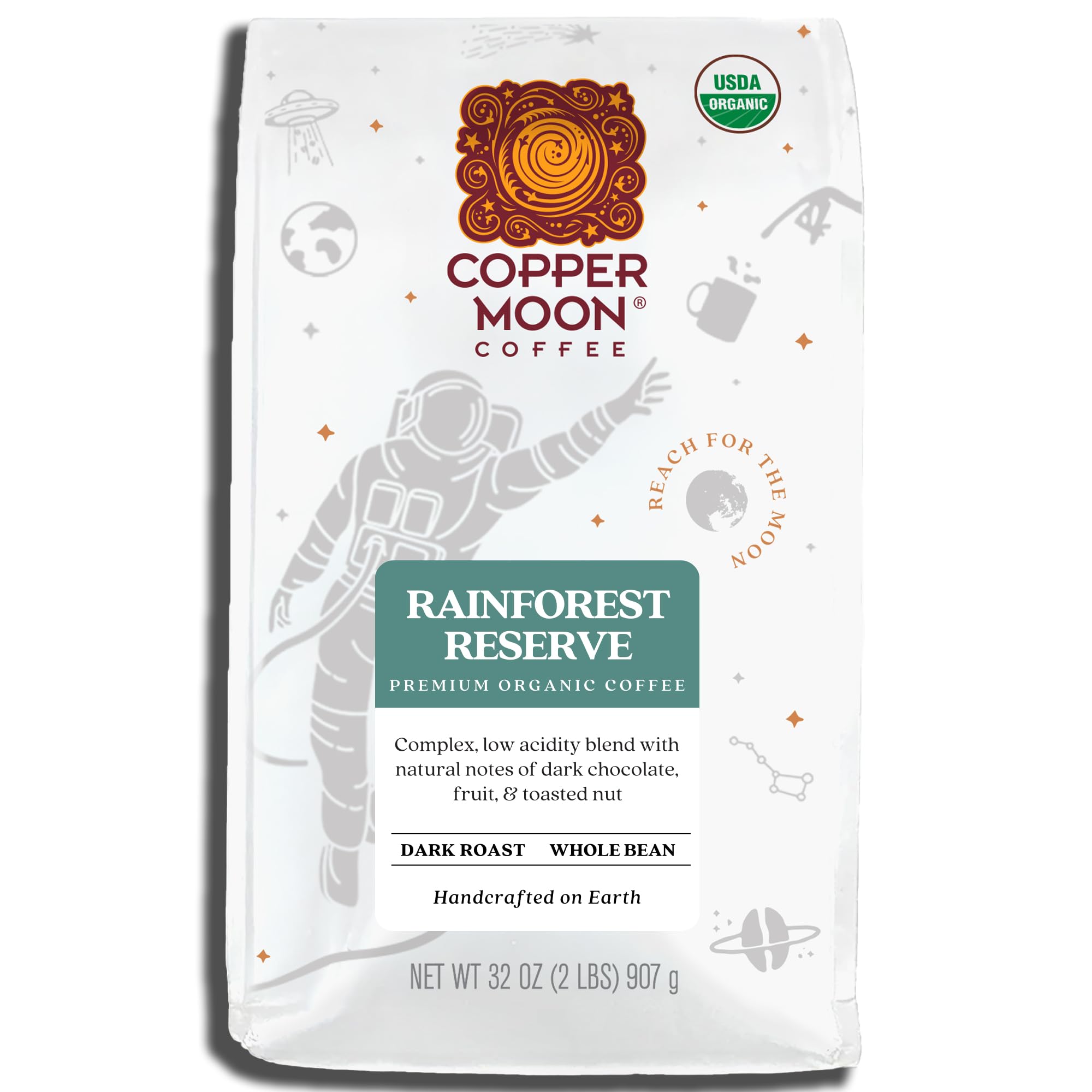 Copper Moon dark roast packaging showing Rainforest Reserve label for premium coffee.