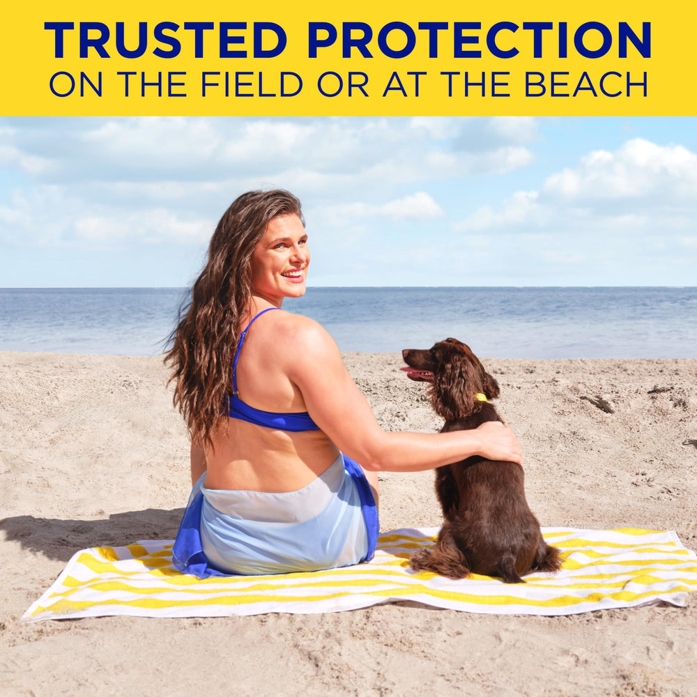 Coppertone Sport lotion on beach bag surface highlights easy access during workouts.