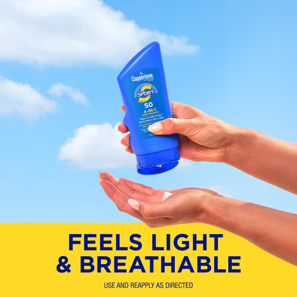 Coppertone SPF 50 bottle in hand demonstrates comfortable, non-greasy feel.