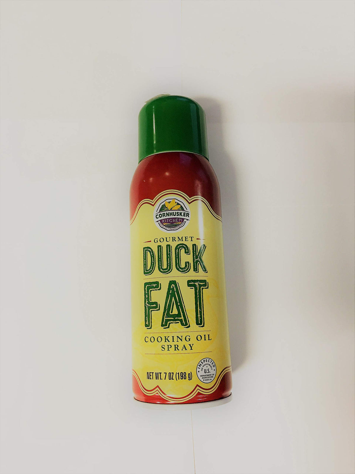 Cornhusker Kitchen Duck Fat Cooking Spray bottle for grilling—high heat and rich flavor.