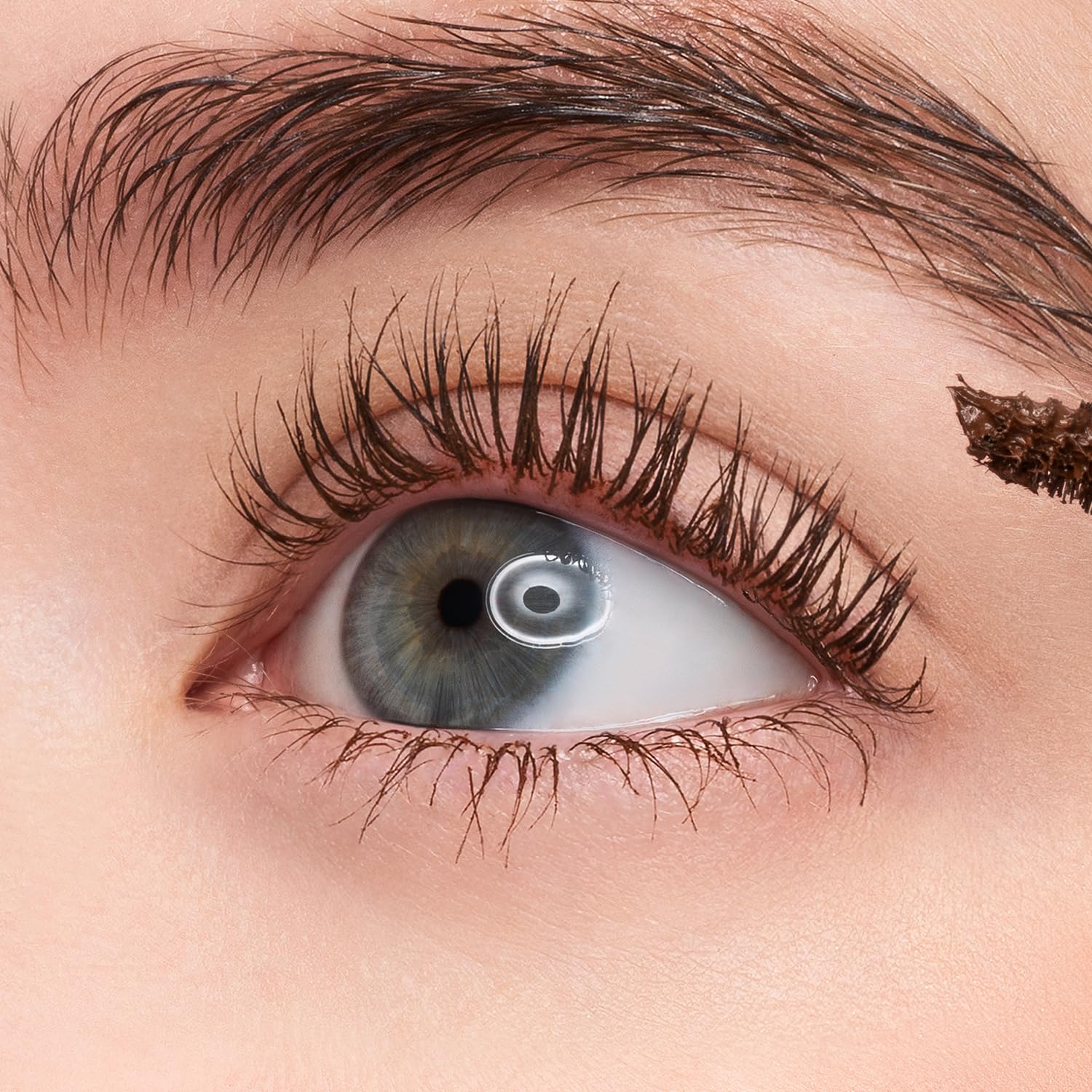 COSNORI Perfect Setting Mascara 02 Cozy Brown ingredient closeup shows silk amino acids benefits.