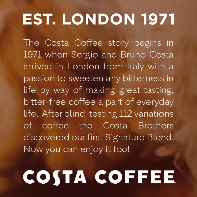 Costa Signature Blend whole beans being ground for a fresh brew
