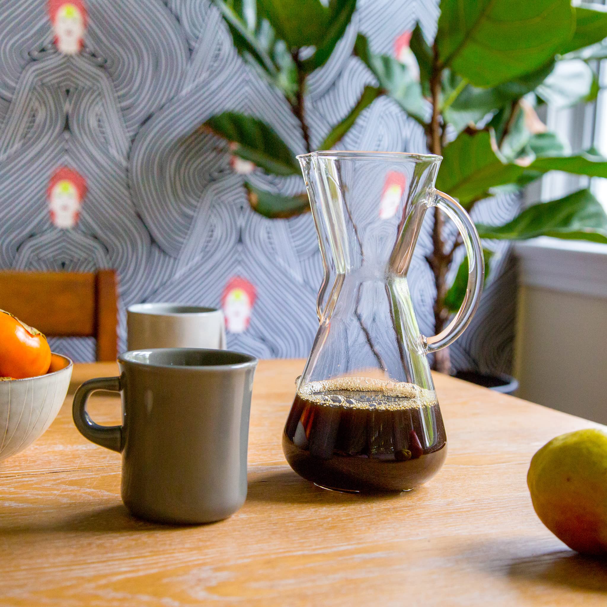 Counter Culture Coffee cup steaming invites you to a premium moment.