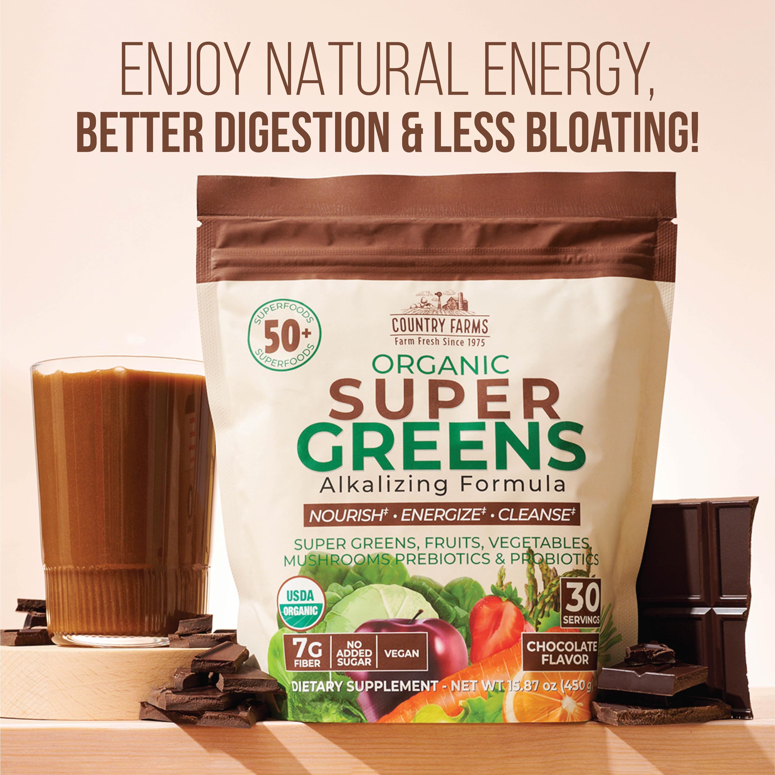 Country Farms Super Greens Chocolate mixed in a glass reveals a smooth, dessert-like color and aroma