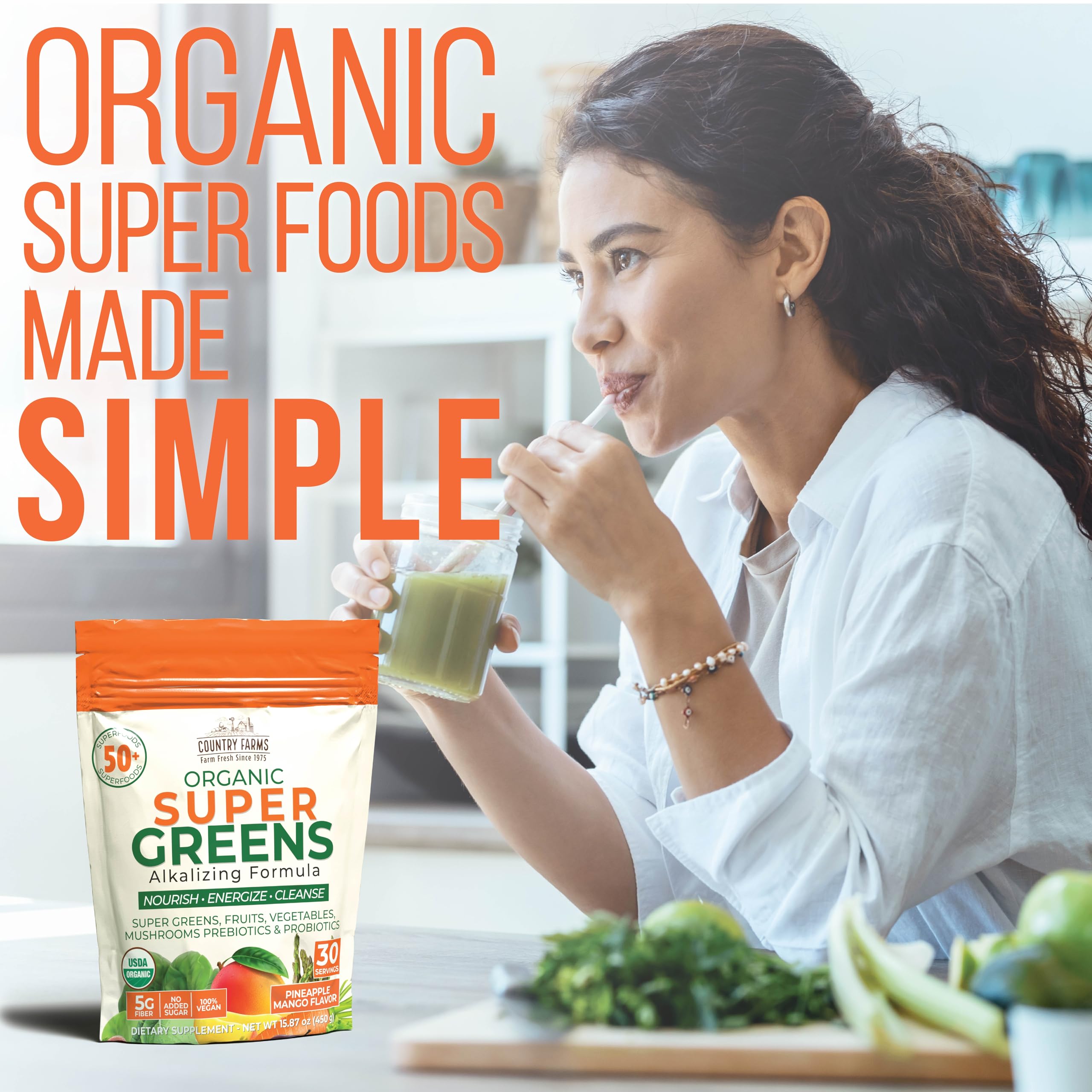 Country Farms Super Greens pineapple-mango label closeup shows organic ingredients and brand quality.