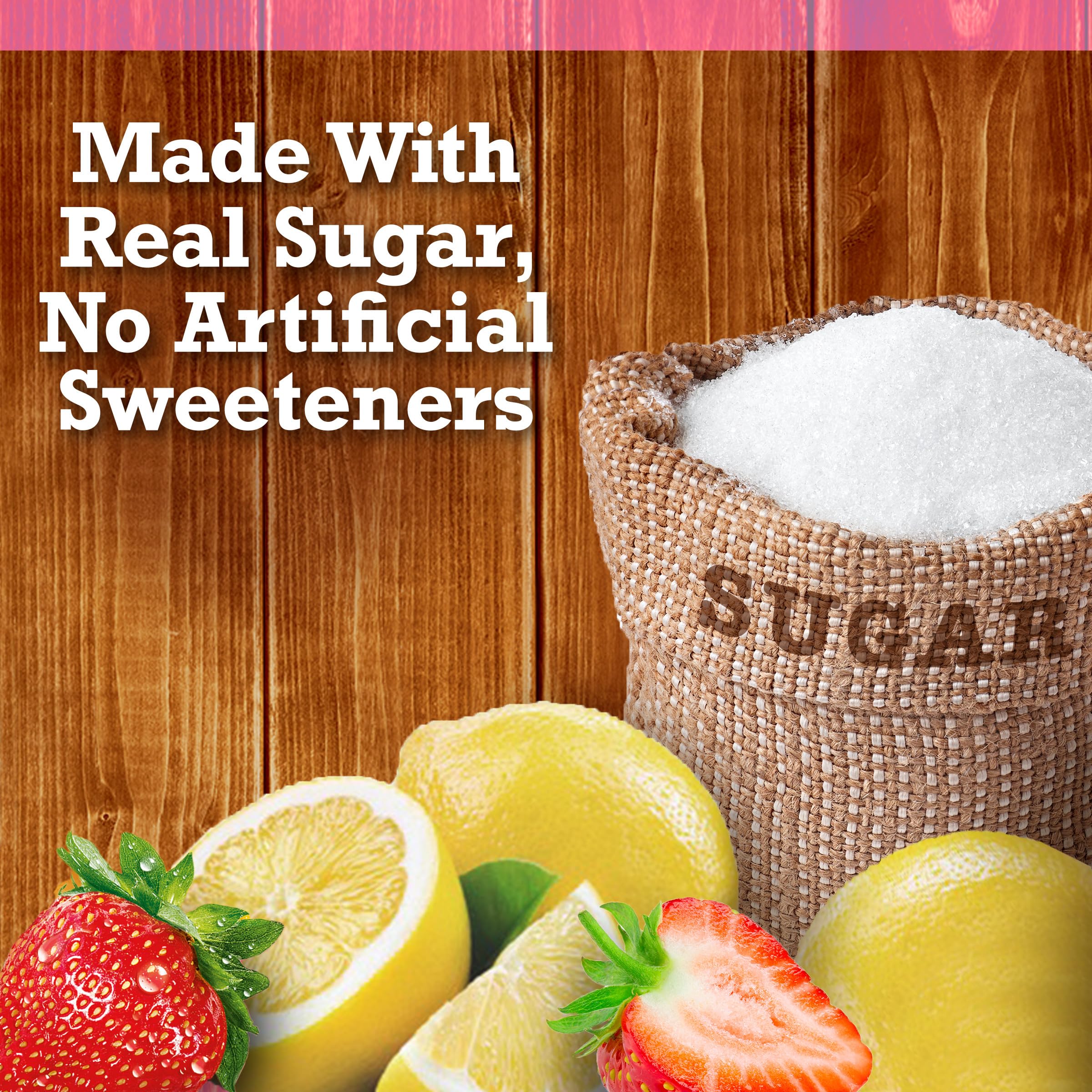 Country Time Strawberry Lemonade pouch held by hand for on-the-go refreshment
