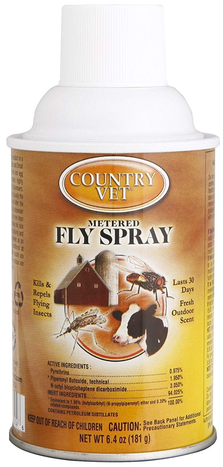 Country Vet fly spray shown in an automatic dispenser setup for hands-free protection.