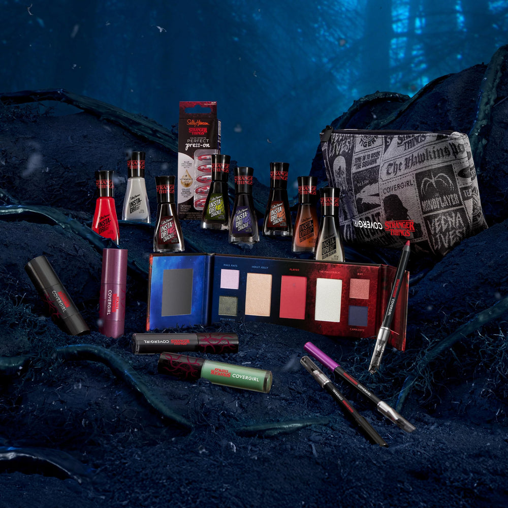 CoverGirl Rift fiery red-orange duo-chrome eyeshadow creates dramatic eye accents.
