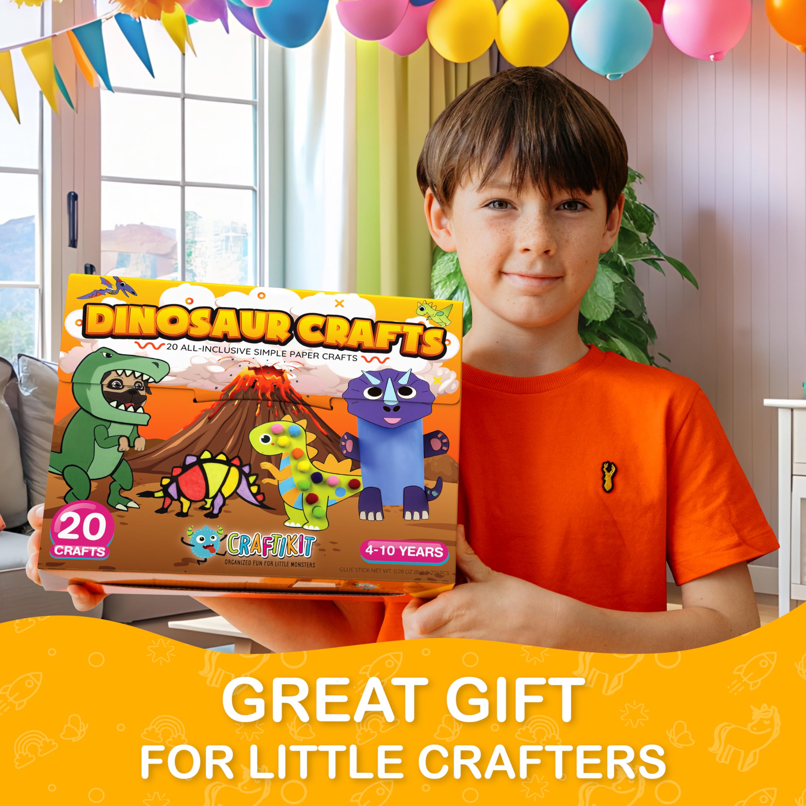 Craftikit dinosaur activity pieces laid out for collaborative crafting