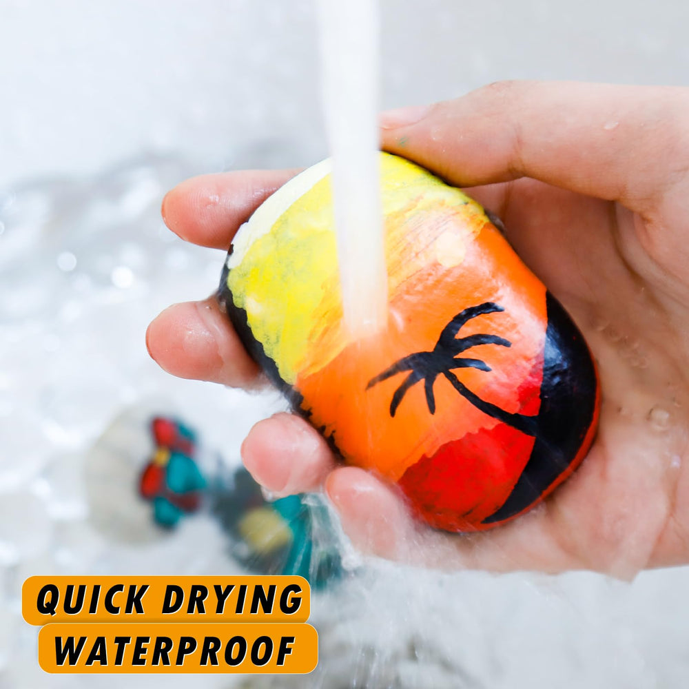 Craiiby yellow paint marker used on wood for bold, fast-drying designs