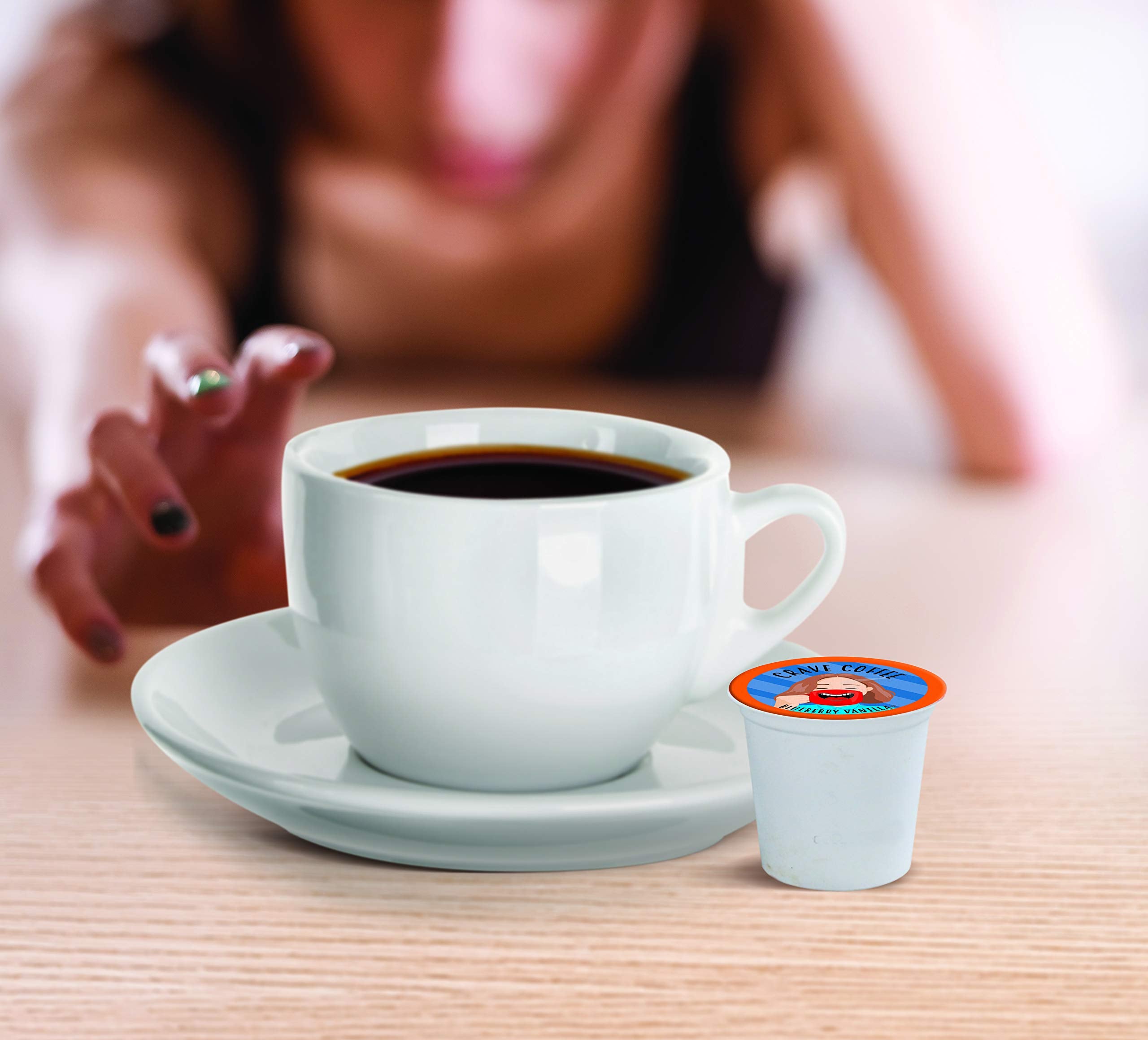 Crave Beverages Arabica coffee pod highlighting premium, fresh roasted beans.