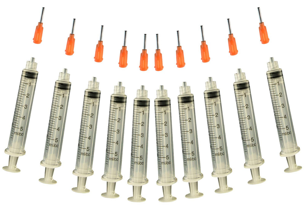 Creative Hobbies glue applicator syringe with orange precision tip for exact rhinestone placement