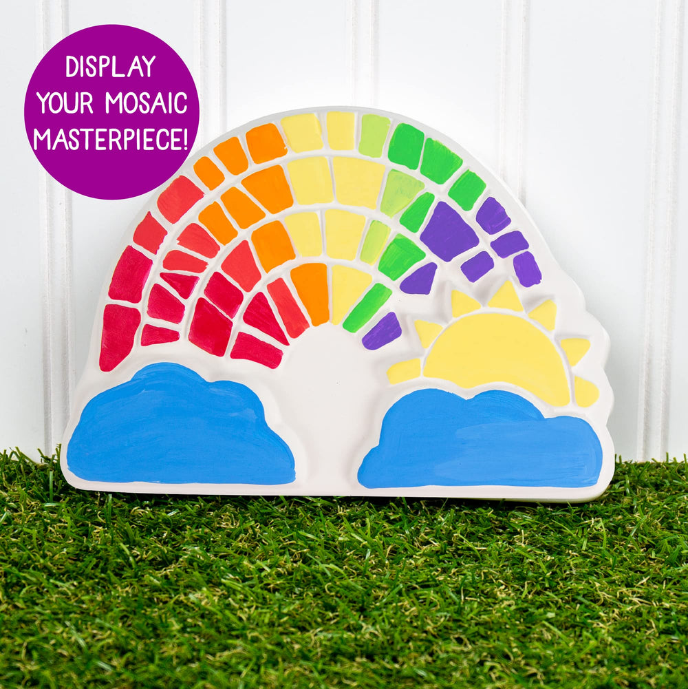 Creative Roots rainbow stone displayed outdoors with weather protection considerations.