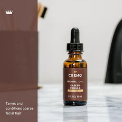Cremo Beard Oil vanilla application scene demonstrates quick absorption and even coverage.