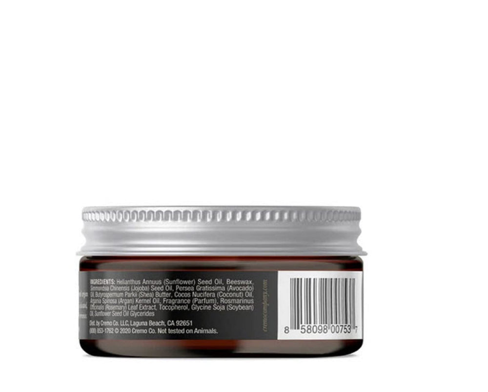 Cremo Distiller's Blend Beard Balm 2oz container ideal for travel.