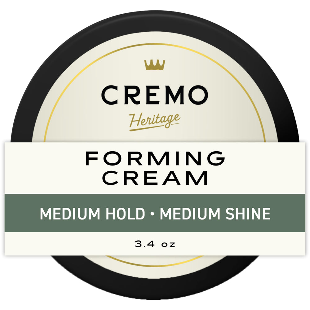 Cremo Hair Styling Cream bottle shows mid-length control and natural texture.
