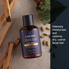 Close-up application shot of Cremo Palo Santo Beard Deep Conditioner for smoother beard