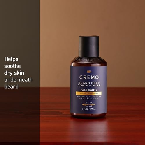 Fragrance swirl over Cremo Palo Santo Beard Deep Conditioner bottle highlighting smoky notes