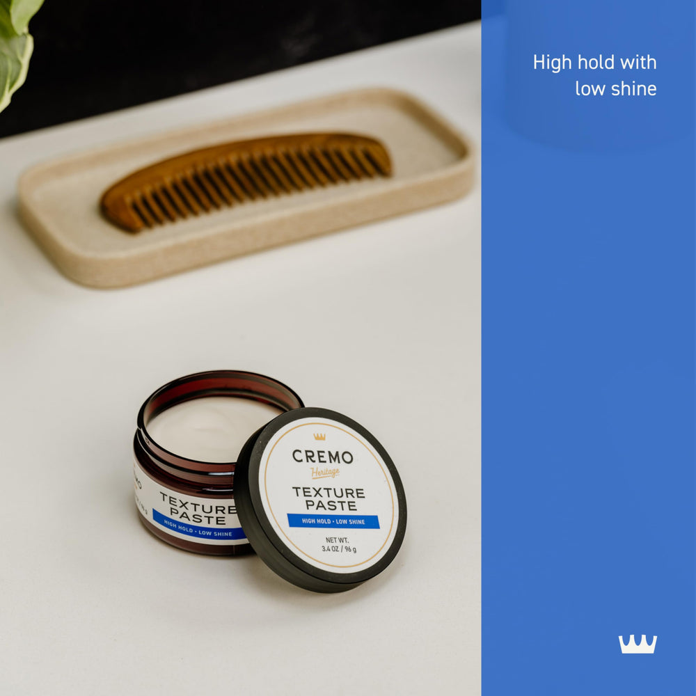 Hands rub Cremo Texture Paste to warm and spread evenly