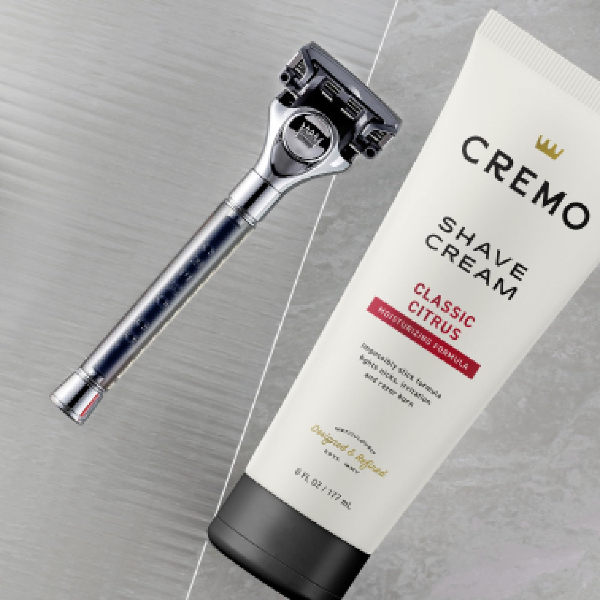 Weighted razor handle visible, designed for balanced, comfortable shaving.