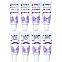 Crest 3D White Brilliance toothpaste tube for everyday whitening and fresh breath.