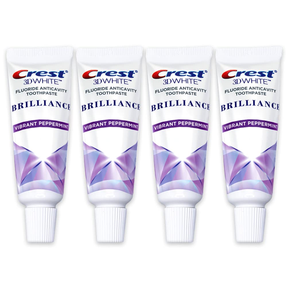 Crest 3D White Brilliance travel-size toothpaste tube for whitening on the go and cavity protection.