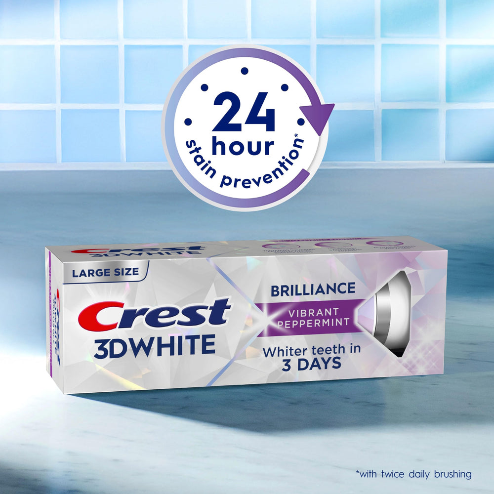 Crest 3D White Brilliance tube with visible foam demonstrates cleaning action