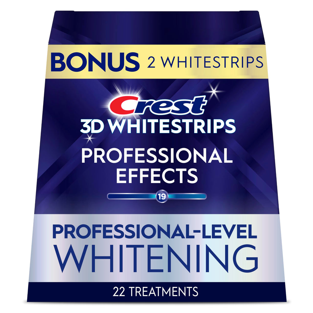 Crest 3D Whitestrips Professional Effects pack opened, revealing the whitening kit contents.