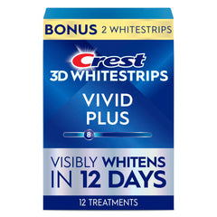 Crest 3D Whitestrips Vivid Plus top strip applied for whitening benefits