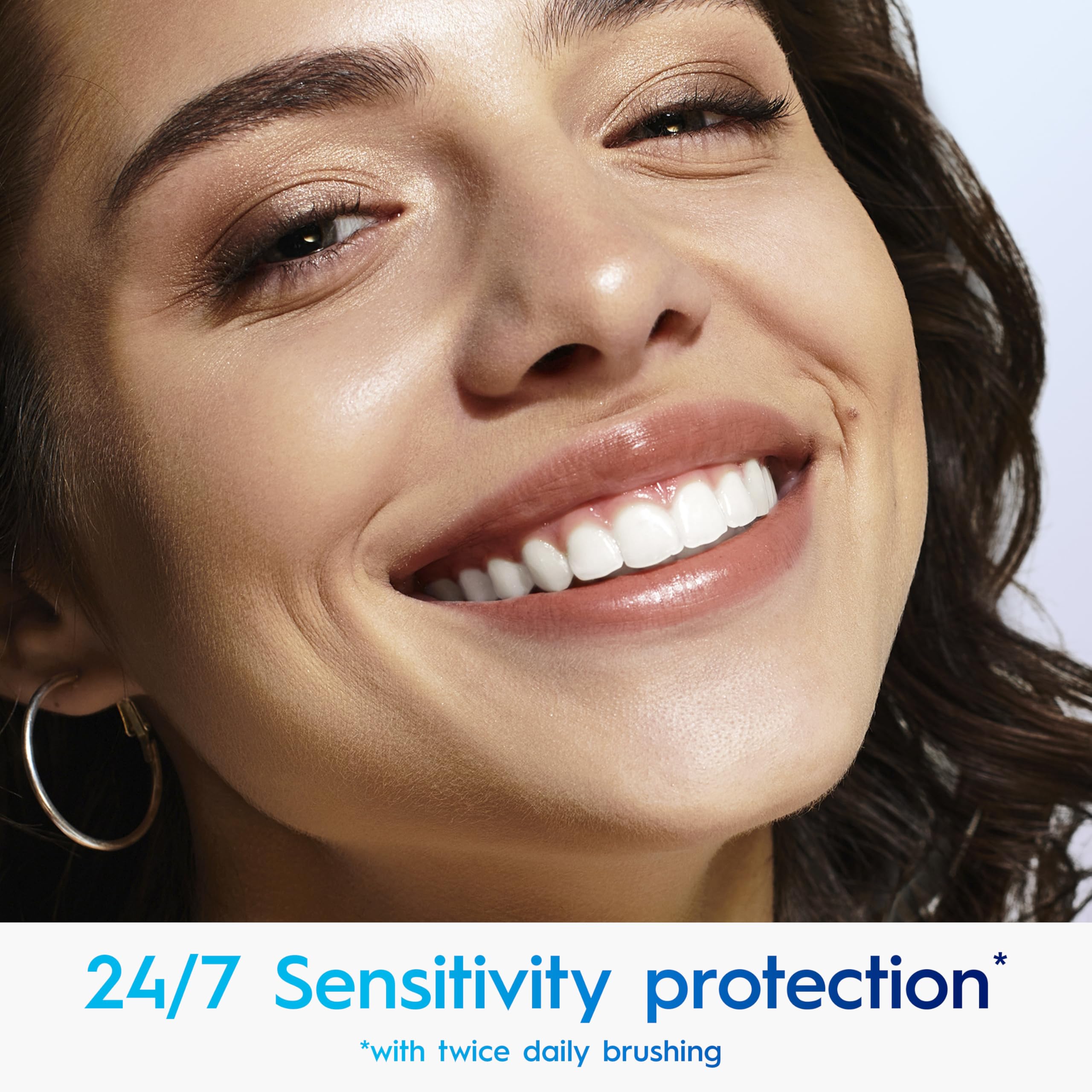 Crest 3DWhite Soft Mint toothpaste being squeezed—demonstrating texture and fresh mint aroma.