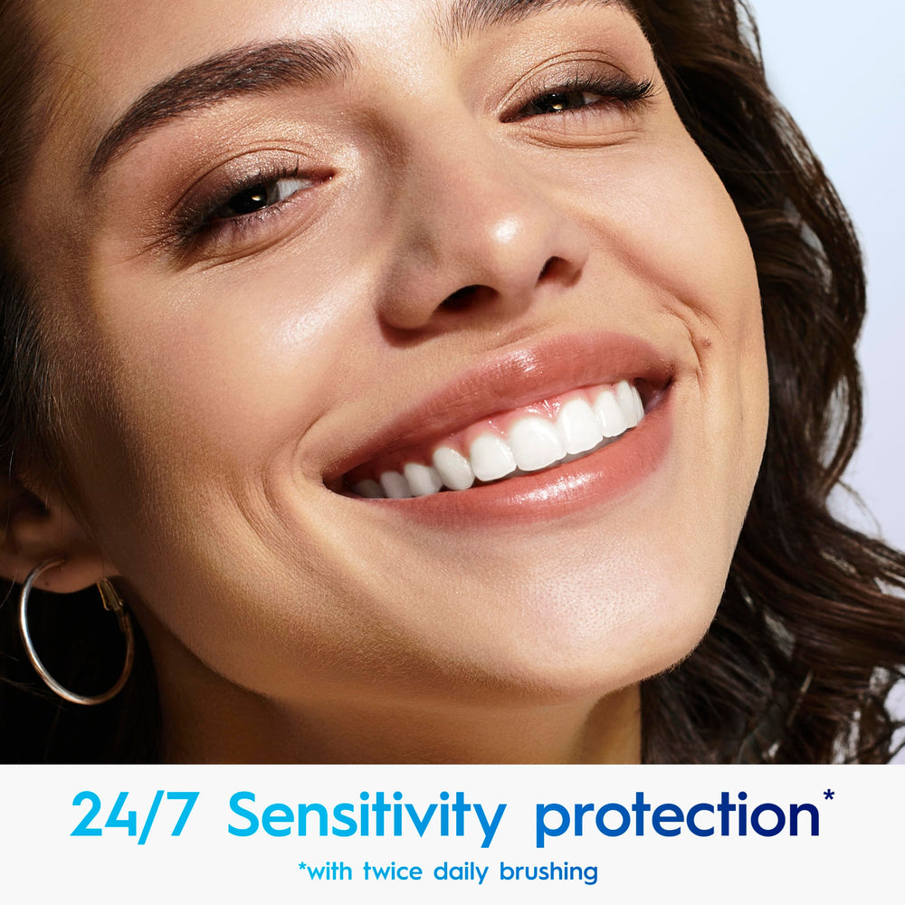 Crest 3DWhite Soft Mint toothpaste being squeezed—demonstrating texture and fresh mint aroma.