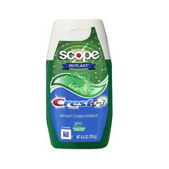 Crest Complete Whitening Plus Scope toothpaste on a toothbrush, delivering minty freshness during brushing.
