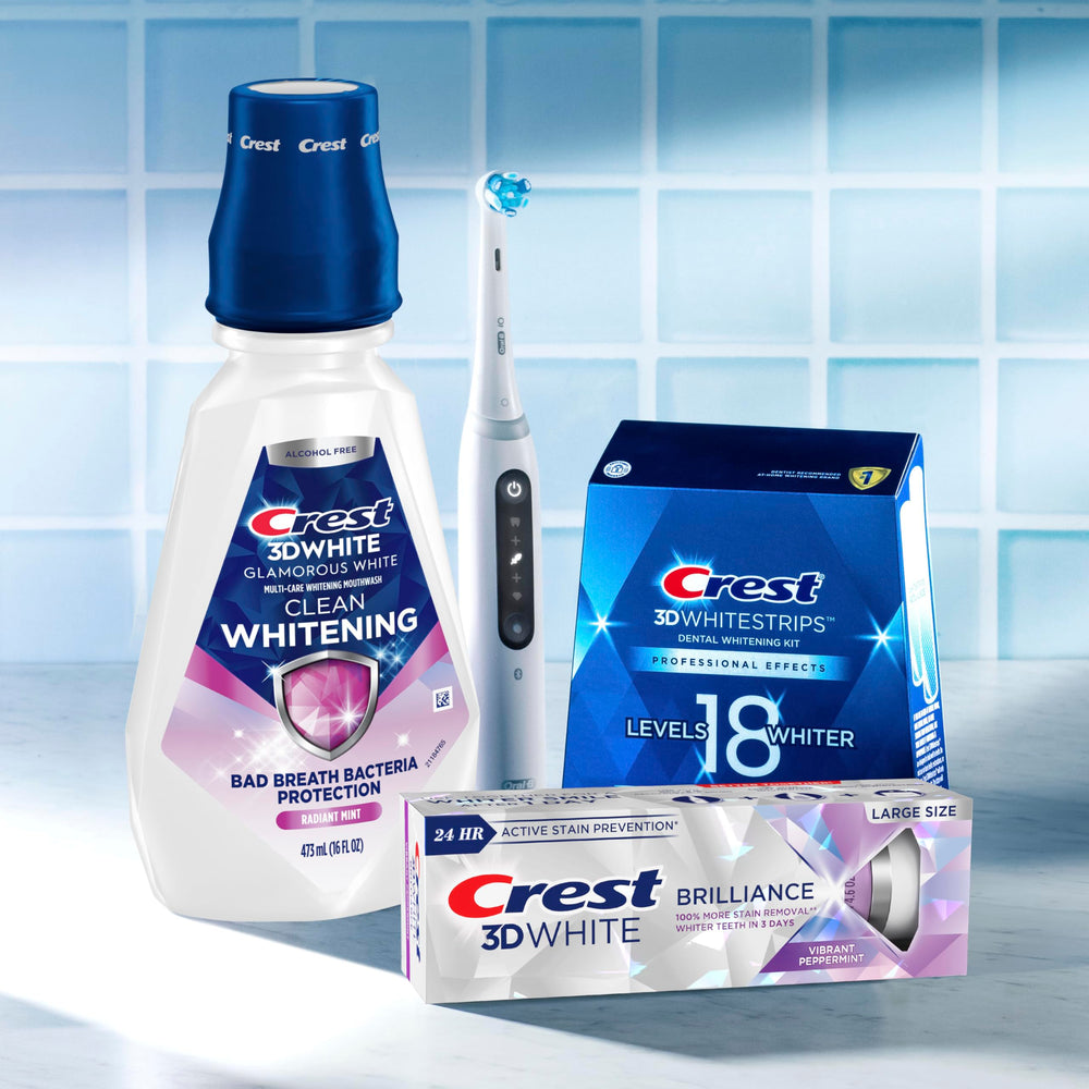Bright bathroom scene with Crest mouthwash on the sink counter.