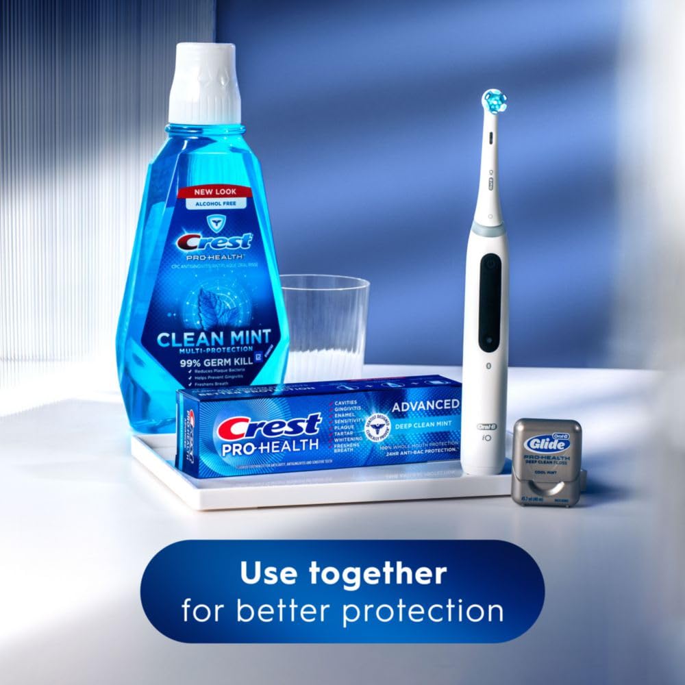 Toothpaste foam from Crest Pro-Health Advanced Deep Clean Mint on a toothbrush
