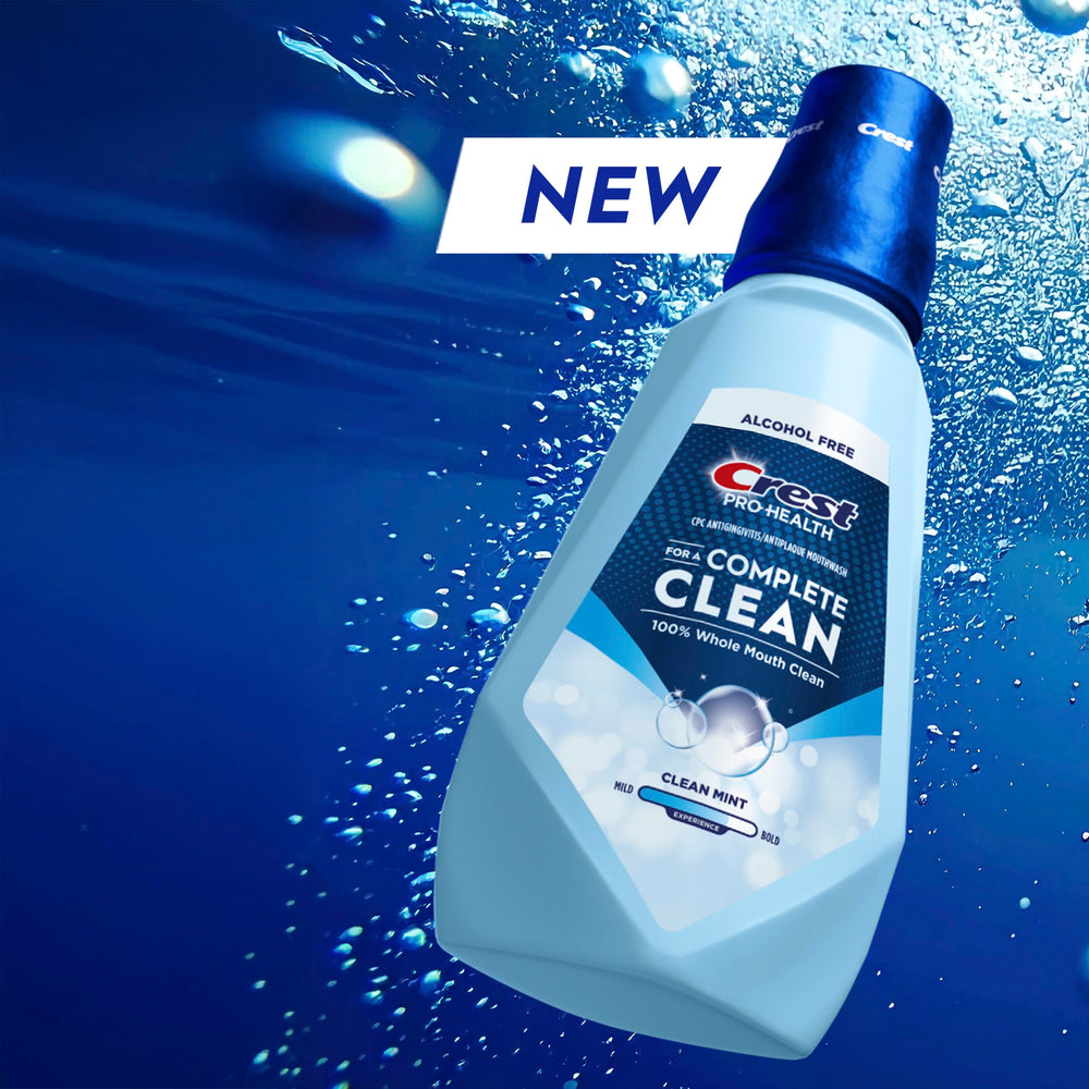 Crest Pro-Health Clean Mint Mouthwash cap shown for precise measure during rinsing.