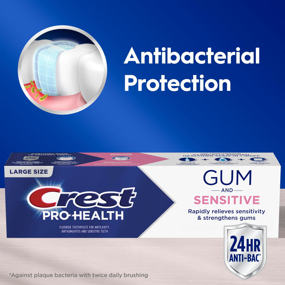 Crest Pro-Health Gum Sensitive tube dispensing foam on brush before brushing